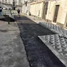 أعمال الاسفلت قدام المنازل