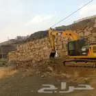 بوكلين البناء الحجر وقص الراضي