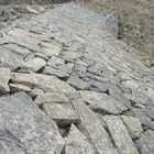بوكلين لبناء الحجر وقص الأراضي والحفر والهدم