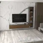 طاوله تلفزيون تنفع معلقه اوعلى الارض