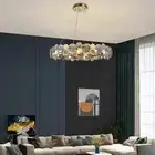 ثريا معلقة بتصميم ذهبي فاخر   فخامة تضيف لمسة ملكية لبيتك