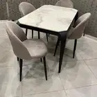 طاولات طعام رخام ارجل حديد   ارجل استيل دهبي فضي