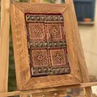 مجسمات ودروع وهدايا على شكل الأبواب النجدية