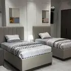 غرفه نوم طراحه سرير كمودينه مكيفات