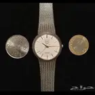 ساعة قديمه عليه شعار الجامعة