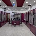دواليب محل نظارات جاهز للاستخدام مع مكتب للبيع
