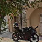 تدريب قيادة الدراجة النارية بالساعه