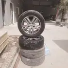 جنوط كامري مقاس 16 عدد 2 مع كفرات نص عمر