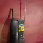 هاتف لاسلكي تراثي ومسجل وقاطع كهرباء