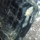 Raw black tourmaline stone... خام حجر التورمالين الأسود