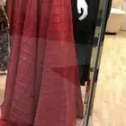 فستان احمر من مصممة
