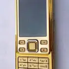 جوال نوكيا ذهبي مع شاحنه