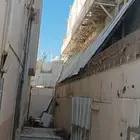 بوكلينات كبيره وصغيره هدم مباني مقابل الانقاض والحديد مقاول