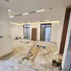 دهان جدران وابواب خشب