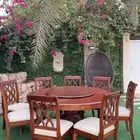 طاولة طعام خشبية دائرية مع 8 كراسي
