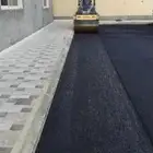 زفلت طرق زفلت أمام المنزل