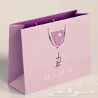 مطبعة أكياس بكج عبايات ورق زبدة تغليف سيفتي تيشيرت يوفي