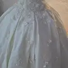فستان عروسة مع مستلزماته