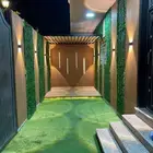 تكسيات جدارية بديل العشب
