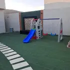 زحليقة مع مرجيحتين وبيت بلاستيك
