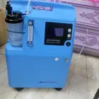جهاز أكسجين وأسطوانة أكسجين