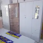 يوجد لدينا جميع الدواليب الخشب والحديد وجميع السراير