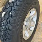 للبيع جنوط رفرف اصليات مع كفرات دنلوب موديل 24 نضاف