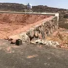 بوكلين حفر خزان وحفر بياره وتسوية الارض