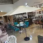 مظلة مع اربع كراسي (يمكنك ايضا تقسيط منتجاتك )