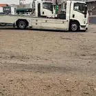 سطحه احد رفيده لنقل السيارات وفتح الابواب وتقديرات الورش
