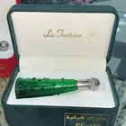 زجاجات او تولات عطور ودهن عود فارغة مع علبه قطيفة فخمة