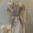 فستان سهرة نسائي فساتين ملكة ذهبي ب ريش ازياء انيقة ملابس