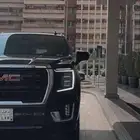 سياره مع سواق بالساعه جمس يوكن