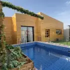 شالية وكوخ بمسبحين والعاب مائيه