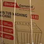 غسالة ملابس جديده