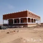 متخصصون في مباني الطبن التراثيه