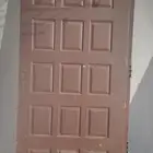 بابين خشب وباب ألمونيوم