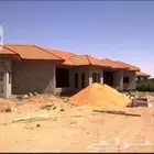 توريد وتنفيذ جميع اعمال القرميد والاسمنت بورد والسنديش بنل