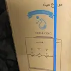 برادة ماء دوتس جديدة بكرتونها لم تستخدم