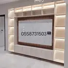 ديكور خلفيات شاشات وتفصيل جميع الرفوف والطاولات والدواليب
