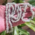 تعليقة من حجر الزمرد الافغاني الخام مشروطة بفحص الجهاز الوز