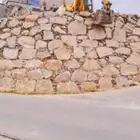 بوكلين لبنا الحجر وقص الارضي وهدم العمار وترحيل