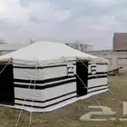 خيام بيضاء مخططه باسود