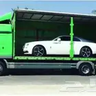 سطحات لنقل دبابات والسيارت من دبي الامارات الى السعودي والكس