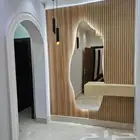 من اعمالنا مرايات مداخل وتسريحات مع رفوف وديكورات خلفيه .
