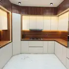 تفصيل مطابخ خشب ودواليب ملابس ومطابخ صاج والمنيوم ورخام