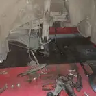 ميكانيك تربيط عضلات سيارات صغير