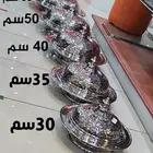 صحون كوزي استيل فضي وذهبي بقاعدة غطاء وبدون غطاء