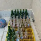 قوارير أو زجاج علب