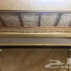 مدخل مع مرآه وكراسي اثنين